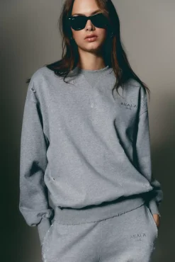 The Akala Studio Distressed Grey Sweater Hot